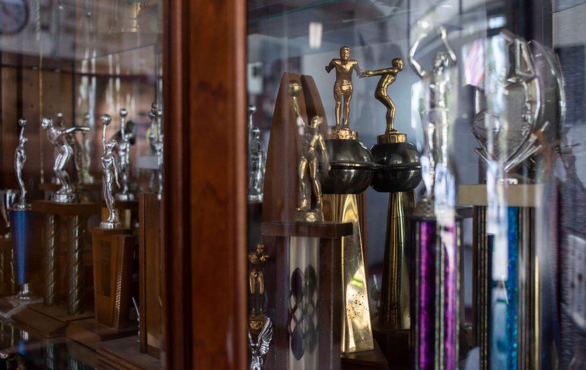 A case full of trophies sits in the hallway near the gym at Holloway Community Center in Kinston, N.C., pictured here on Jan. 13, 2022.