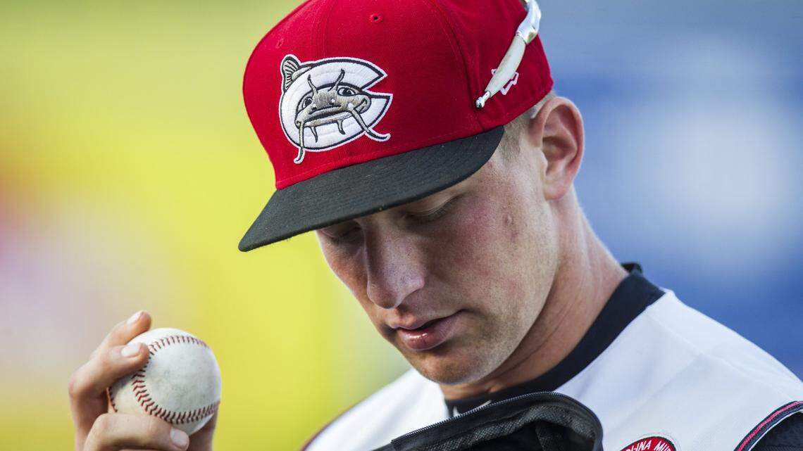Former Carolina outfielder Connor Lien dons a cap with Frank Harrod’s famous Mudcats logo on it.