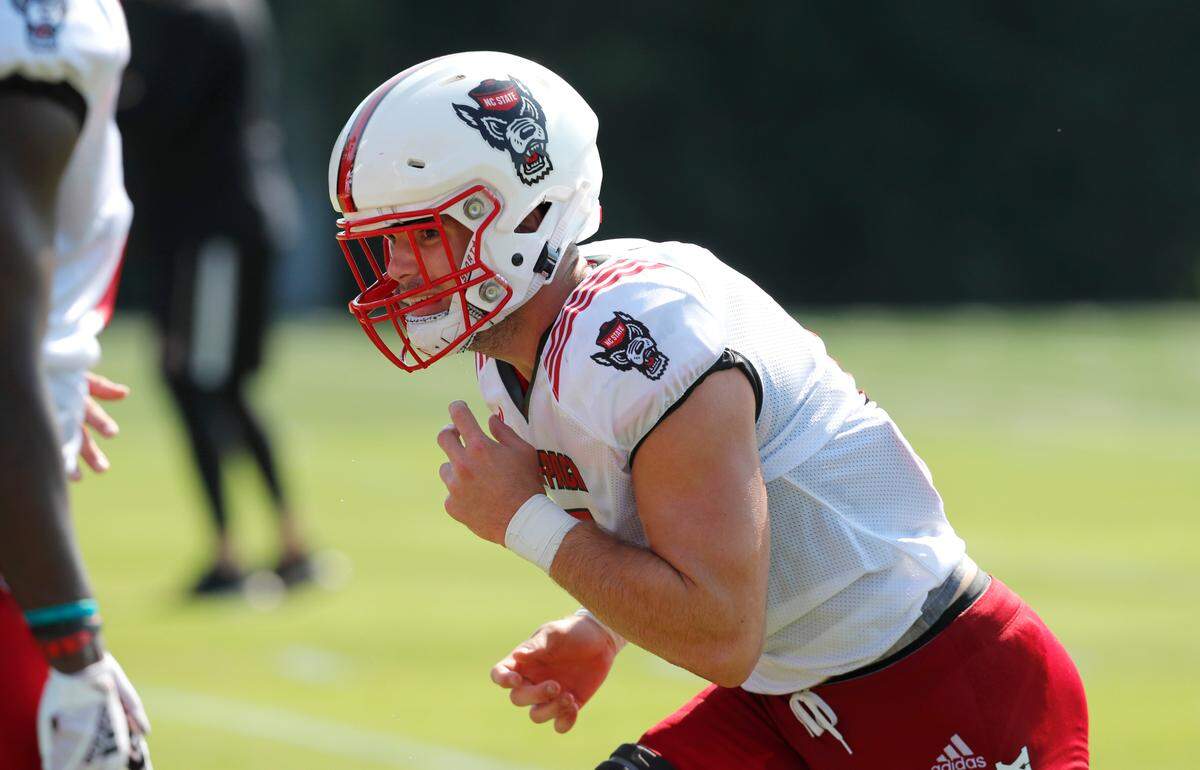 N.C. State linebacker Payton Wilson (11) runs drills during the Wolfpack’s practice in Raleigh, N.C. Tuesday, August 6, 2019.