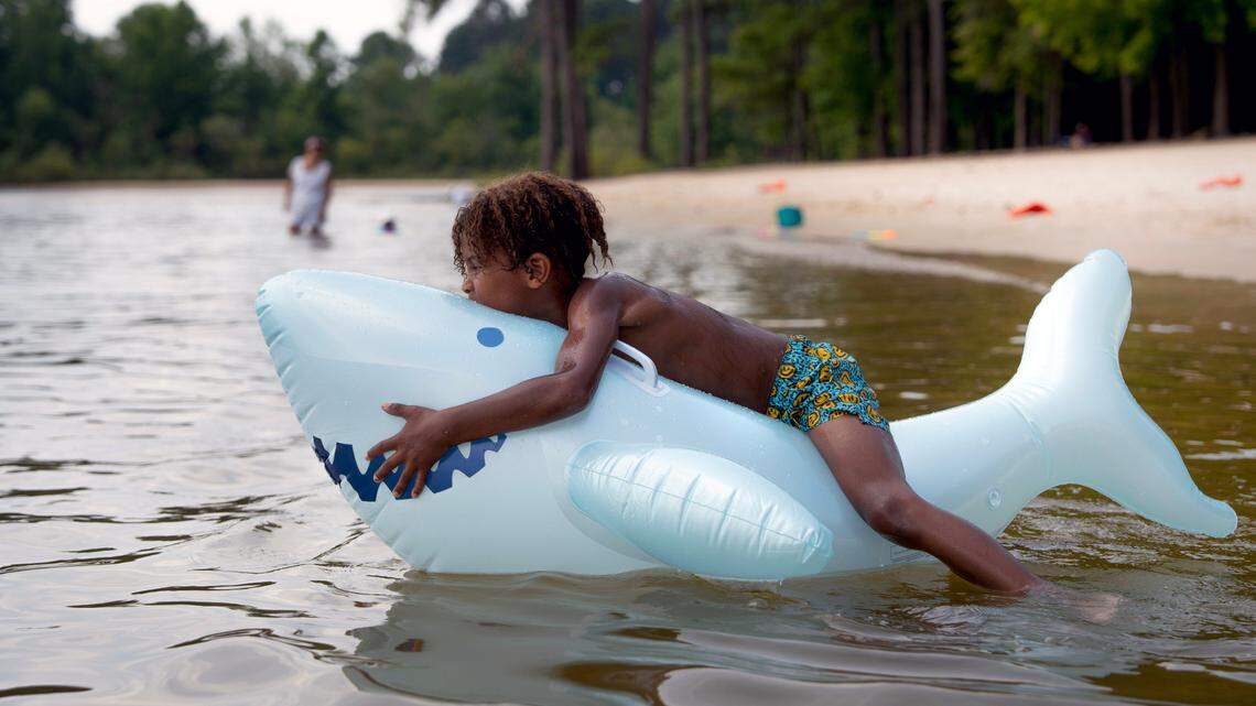Beating the heat, or even dealing with it, can be tough, even at Jordan Lake’s Seaforth Beach on June 24, 2025. Heat index values are forecast to peak in the 105-109° range for several days this week.
