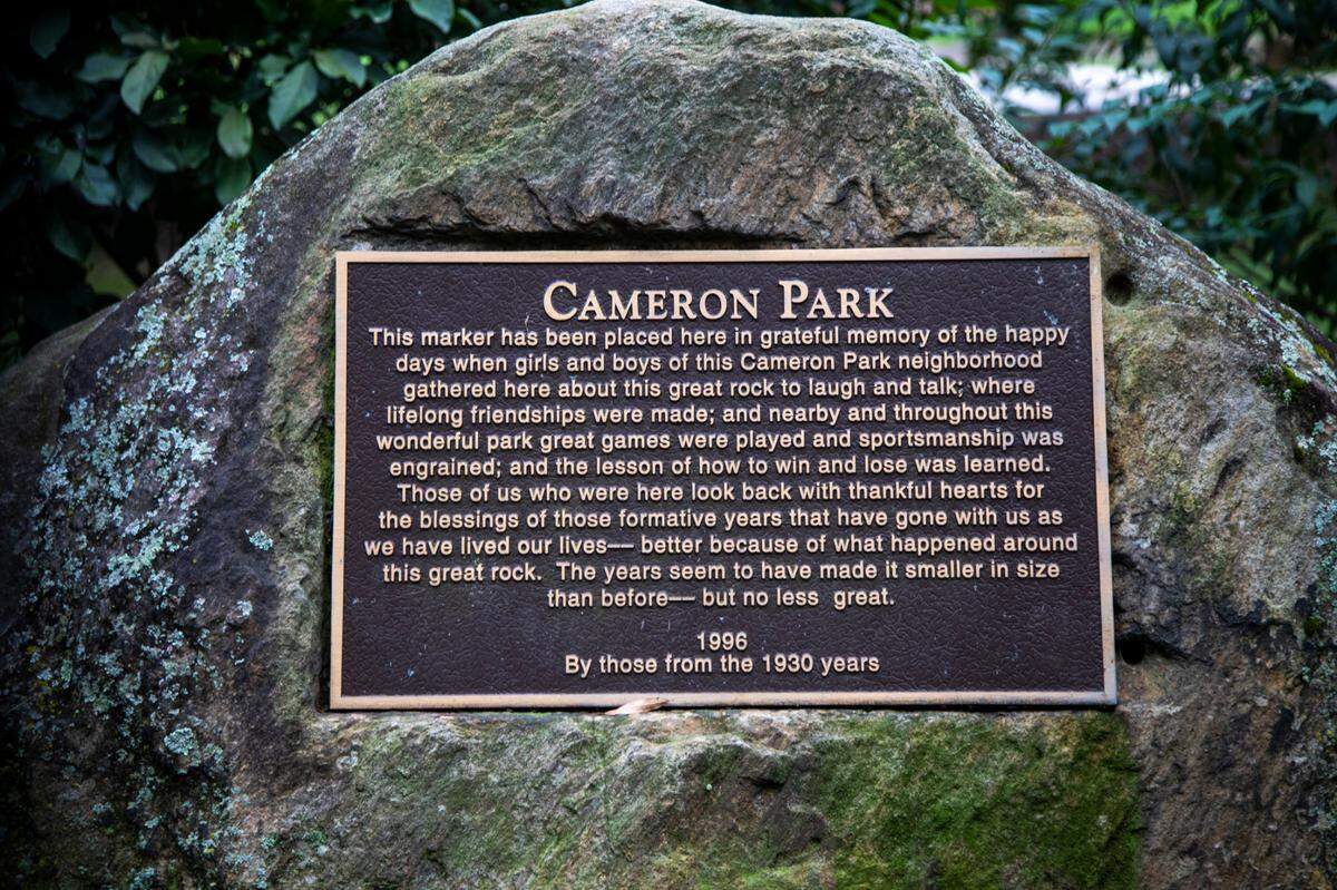 A plaque is affixed to a rock in the Cameron Park neighborhood in Raleigh Wednesday, Sept. 22, 2021. Developed in the early 1910s to attract upper-middle-class residents, Cameron Park is one of the Raleigh’s most prominent neighborhoods. Residents have until Thursday, Sept. 23, 2021 to cast their vote on whether to change its name referencing the family that once was one of the largest holders of enslaved people in North Carolina.