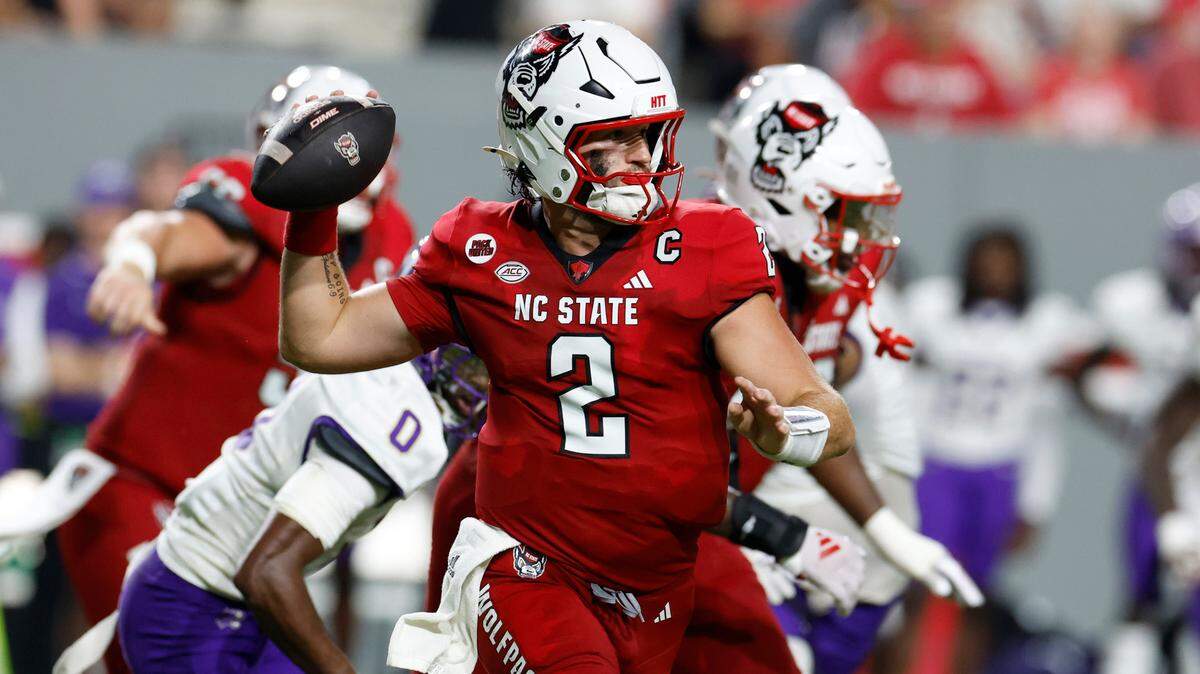 N.C. State quarterback Grayson McCall (2) looks to throw to a receiver downfield during the second half of N.C. State’s 38-21 victory over Western Carolina at Carter-Finley Stadium in Raleigh, N.C., Thursday, August 29, 2024.