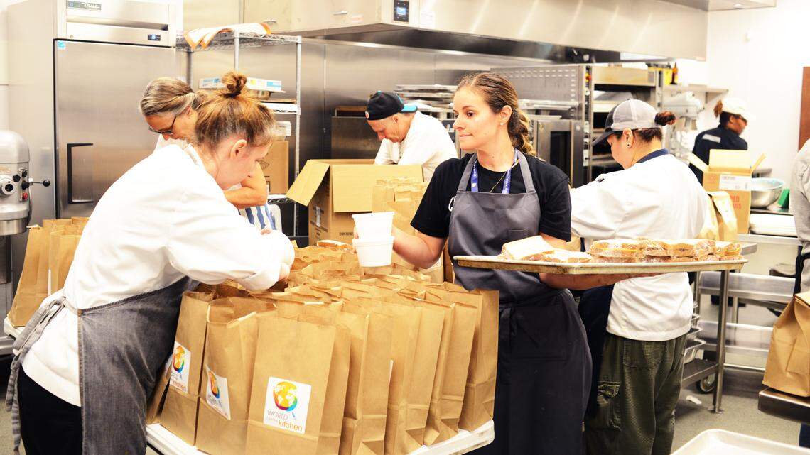 Volunteers with World Central Kitchen pack lunches for first responders in flooded Eastern North Carolina.