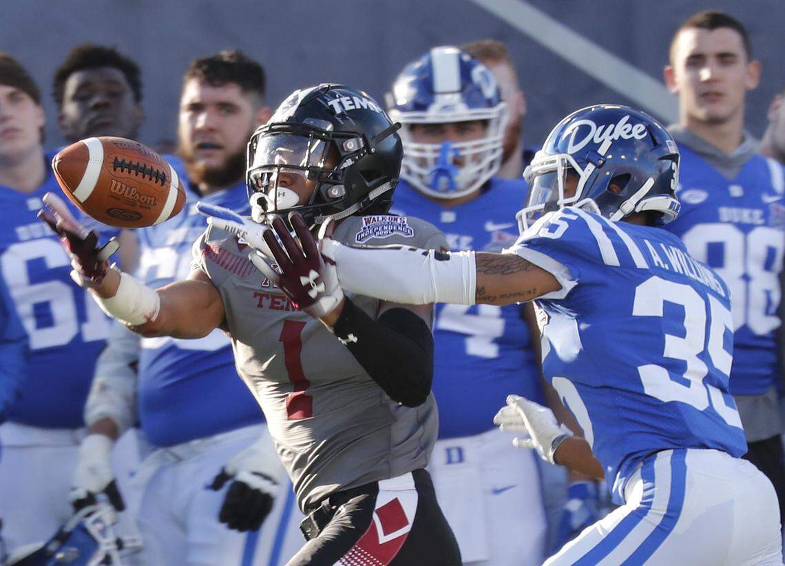Former Temple wide receiver Ventell Bryant (1) bobbles a pass as Duke cornerback Antone Williams (35) closes in during the second half of the Independence Bowl in Shreveport, La., Thursday, Dec. 27, 2018. Duke won 56-27.