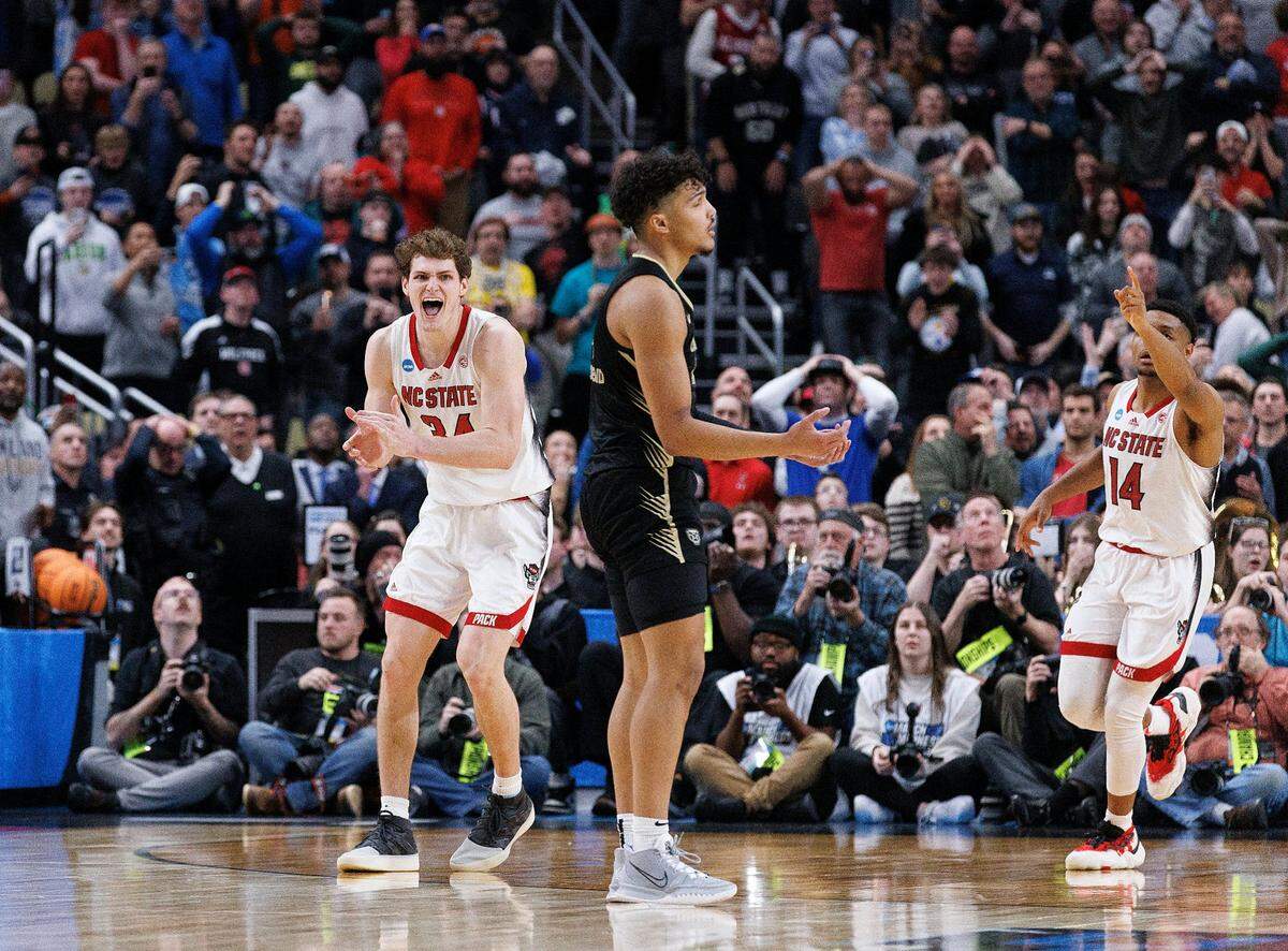 N.C. State’s Ben Middlebrooks reacts following an Oakland turnover during overtime in the Wolfpack’s 79-73 win in the second round of the NCAA Tournament on Saturday, March 23, 2024, at PPG Paints Arena in Pittsburgh, Pa.