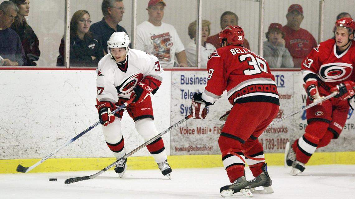 Keith Aucoin (from left to right), Vince Bellissimo and Jakub Vojta compete in a scrimmage during the Carolina Hurricanes 2006 Training Camp at the RecZone in Raleigh on Monday, Sept. 18, 2006.