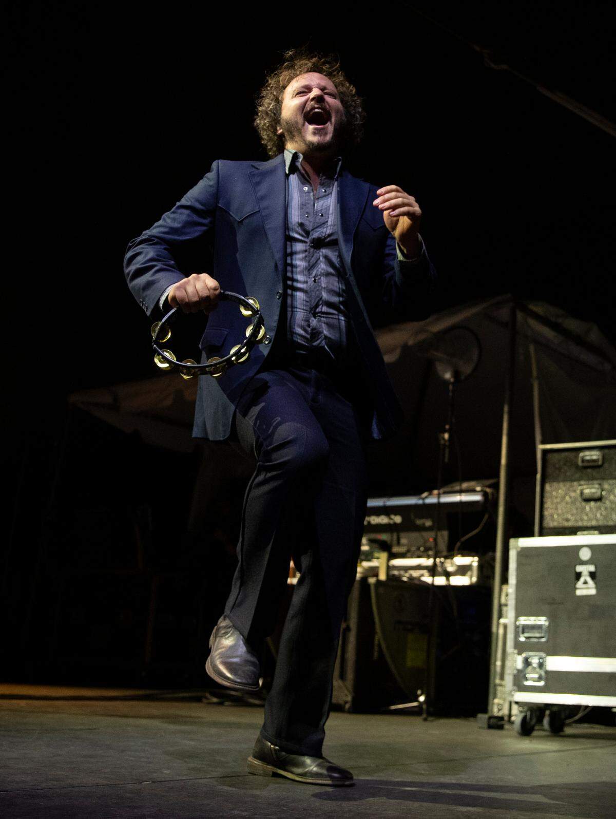 Mark Shusterman of Nathaniel Rateliff and The Night Sweats dances on stage at Raleigh, N.C.’s Red Hat Amphitheater, Wednesday night, Sept. 27, 2023.