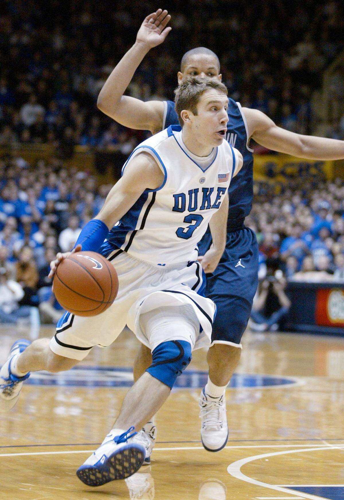 Duke’s Greg Paulus (3) drives past a Georgetown defender in the first half of their game at Cameron Indoor Stadium on Saturday, Jan. 17, 2009.