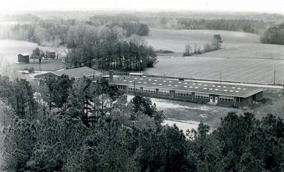 A two-story brick building (at left) replaced the former Rosenwald School that served Black students in Holly Springs in 1951. The long, one-story section was added several years later. Parts of the school still exist today at the W.E. Hunt Recreation Center.