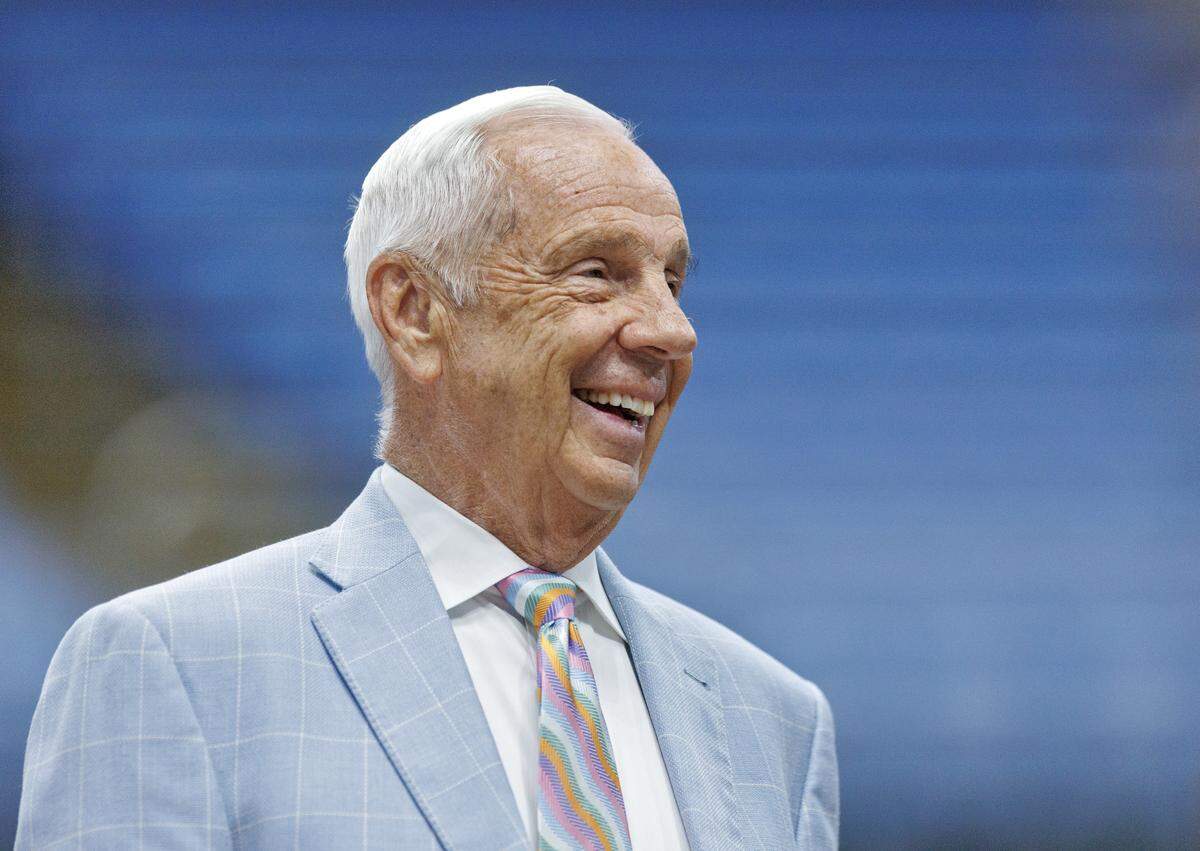 Roy Williams smiles as he arrives at the Smith Center for a press conference to introduce new North Carolina men’s basketball head coach Michael Malone on Tuesday, April 7, 2026, in Chapel Hill, N.C. 