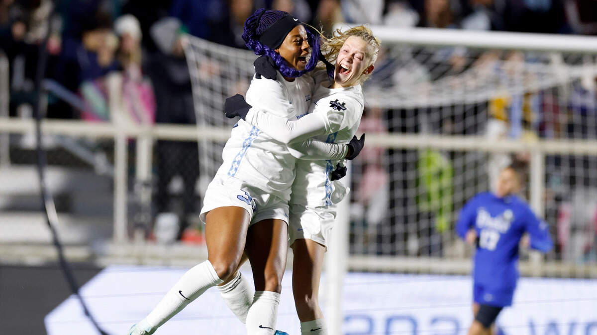 North Carolina’s Olivia Thomas (33) celebrates with Maddie Dahlien (5) after Thomas scored during the first half of UNC’s game against Duke in the semifinals of the 2024 Women’s College Cup at WakeMed Soccer Park in Cary, N.C., Friday, Dec. 6, 2024.