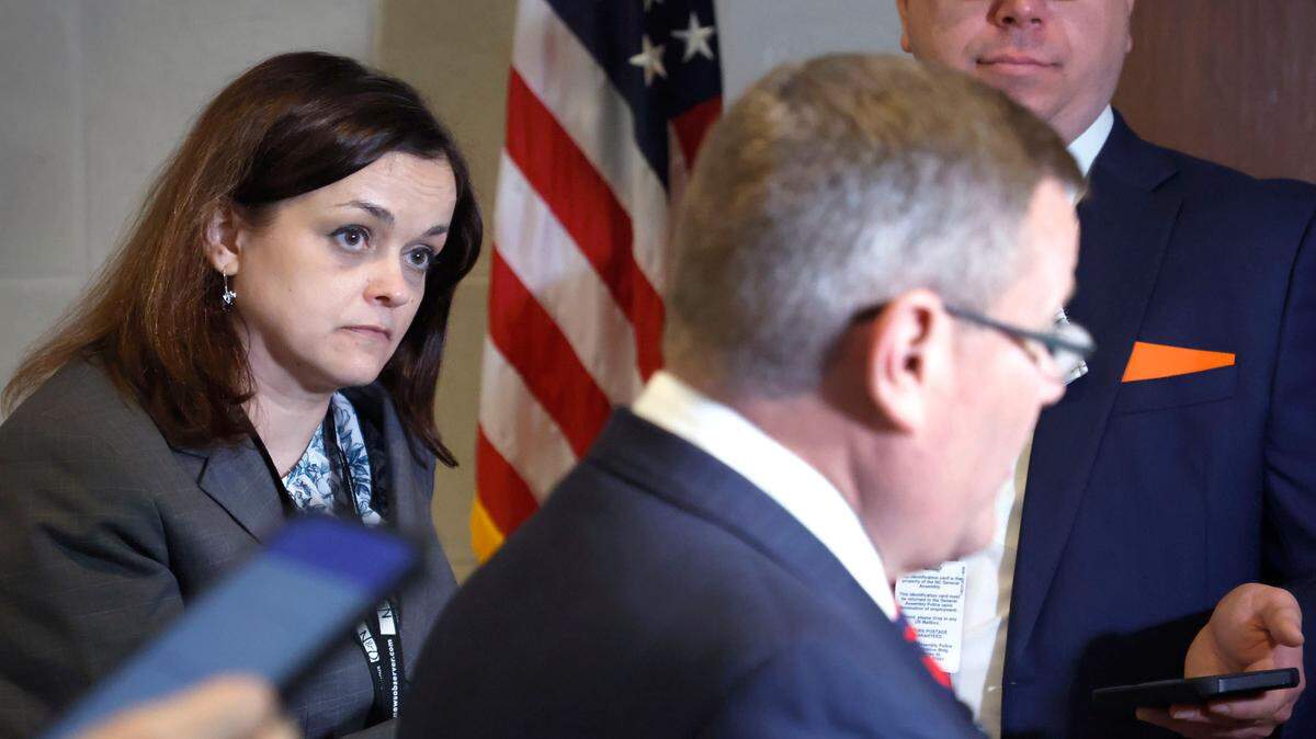 Dawn Vaughan listens to House Speaker Tim Moore during a press gaggle the first day of session of the N.C. House of Representatives, Wednesday, Jan. 11, 2023.
