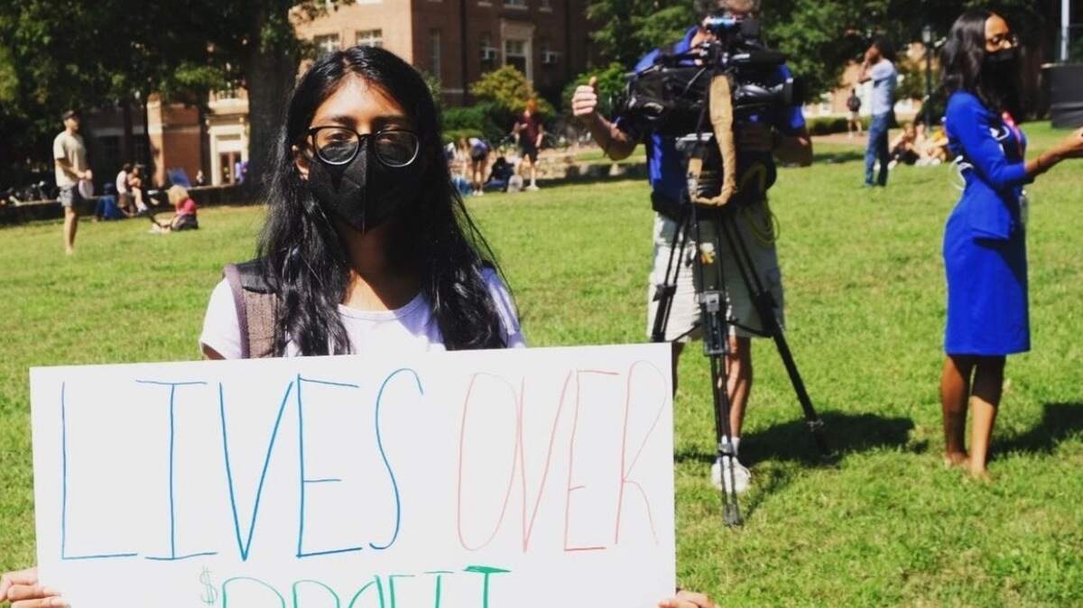 UNC-Chapel Hill student government leader Sneha Pasapula attends a rally on campus advocating for COVID-19 vaccines.