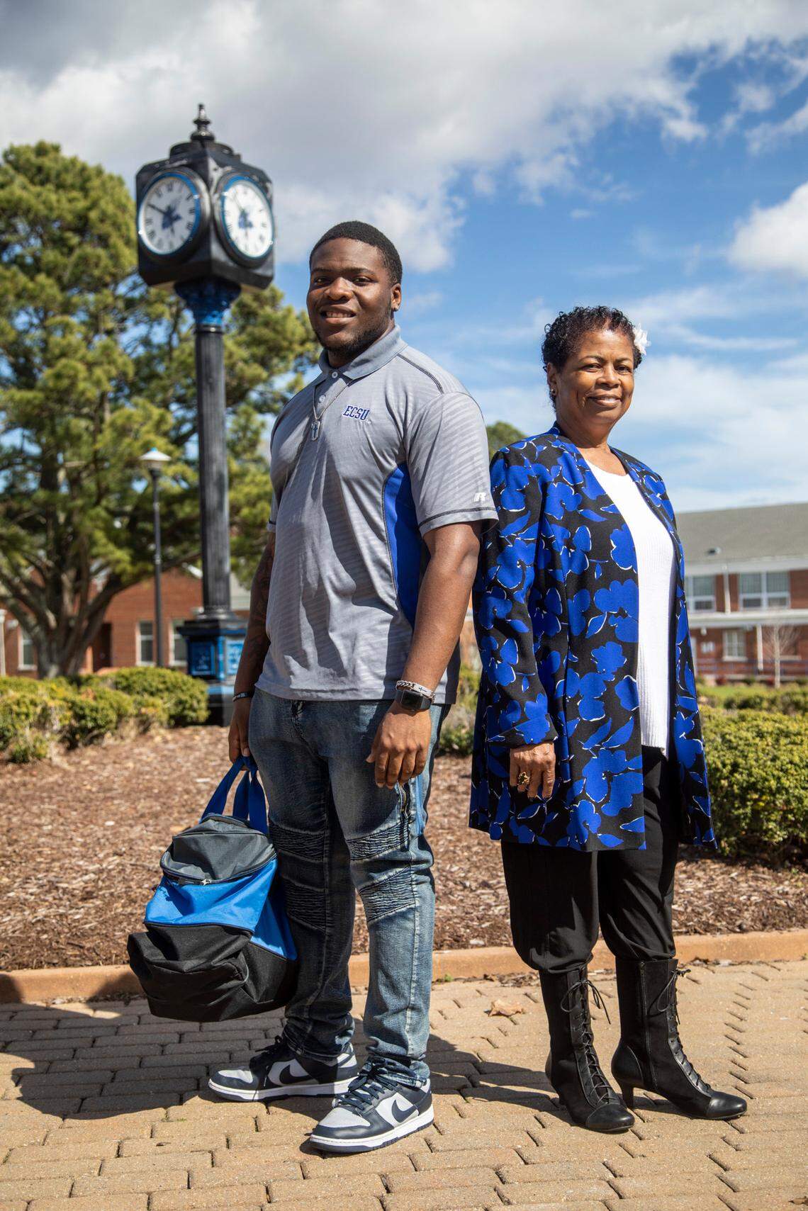 Juanya’ Majette, a senior linebacker at Elizabeth City State University and Elizabeth City Mayor Bettie Parker, a 1971 graduate, pose for a photograph on campus Tuesday, March 1, 2022.