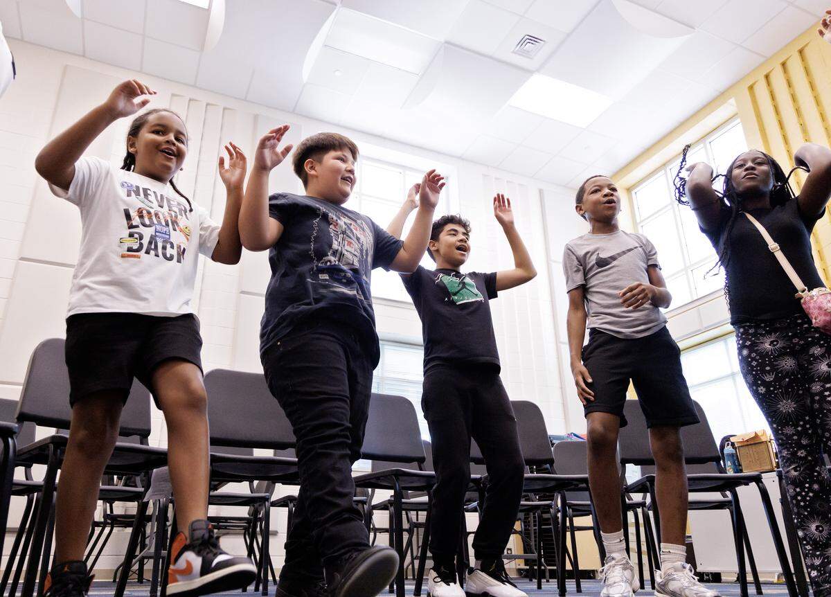 Students warm up during a chorus class on Friday, Aug. 15, 2025, at Neuse River Middle School in Raleigh, N.C.
