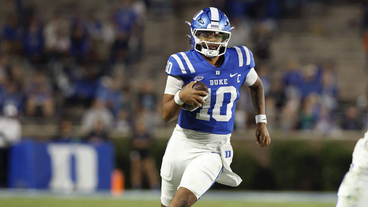 Duke quarterback Darian Mensah runs the ball during the second half of the Blue Devils’ 34-17 loss to Virginia on Saturday, Nov. 15, 2025, at Wallace Wade Stadium in Durham, N.C.
