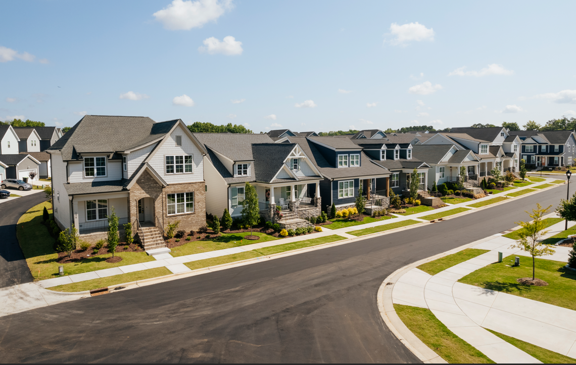 A row of homes built by Homes by Dickerson in Wendell Falls, the Triangle’s largest master-planned community.