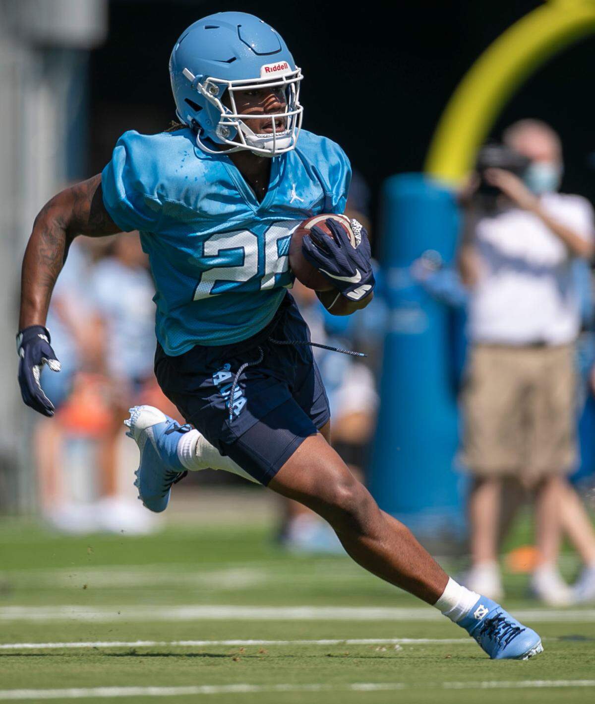 North Carolina running back D.J. Jones (26) carries the ball during the Tar Heels’ first day of practice on Thursday, August 5, 2021 in Chapel Hill N.C.