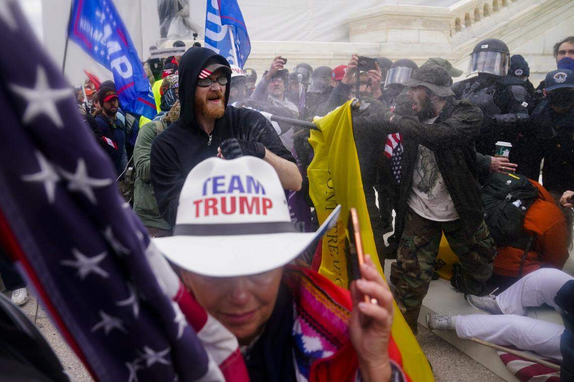 Trump supporters try to break through a police barrier, Wednesday, Jan. 6, 2021, at the Capitol in Washington. As Congress prepares to affirm President-elect Joe Biden’s victory, thousands of people have gathered to show their support for President Donald Trump and his claims of election fraud.