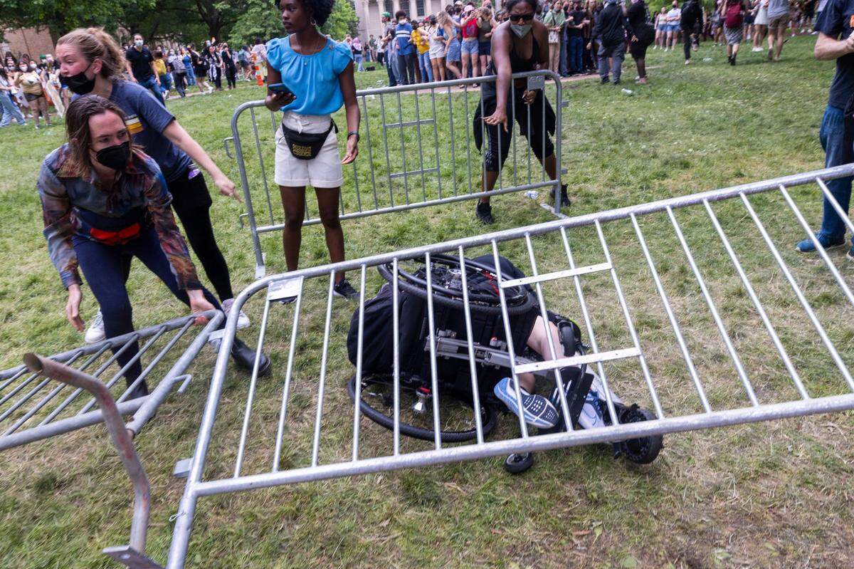 At a protest on April 30, 2024, Laura Saavedra Forero and her wheelchair were knocked to the ground and pinned under temporary fencing when Pro-Palestinian protesters clashed with police.