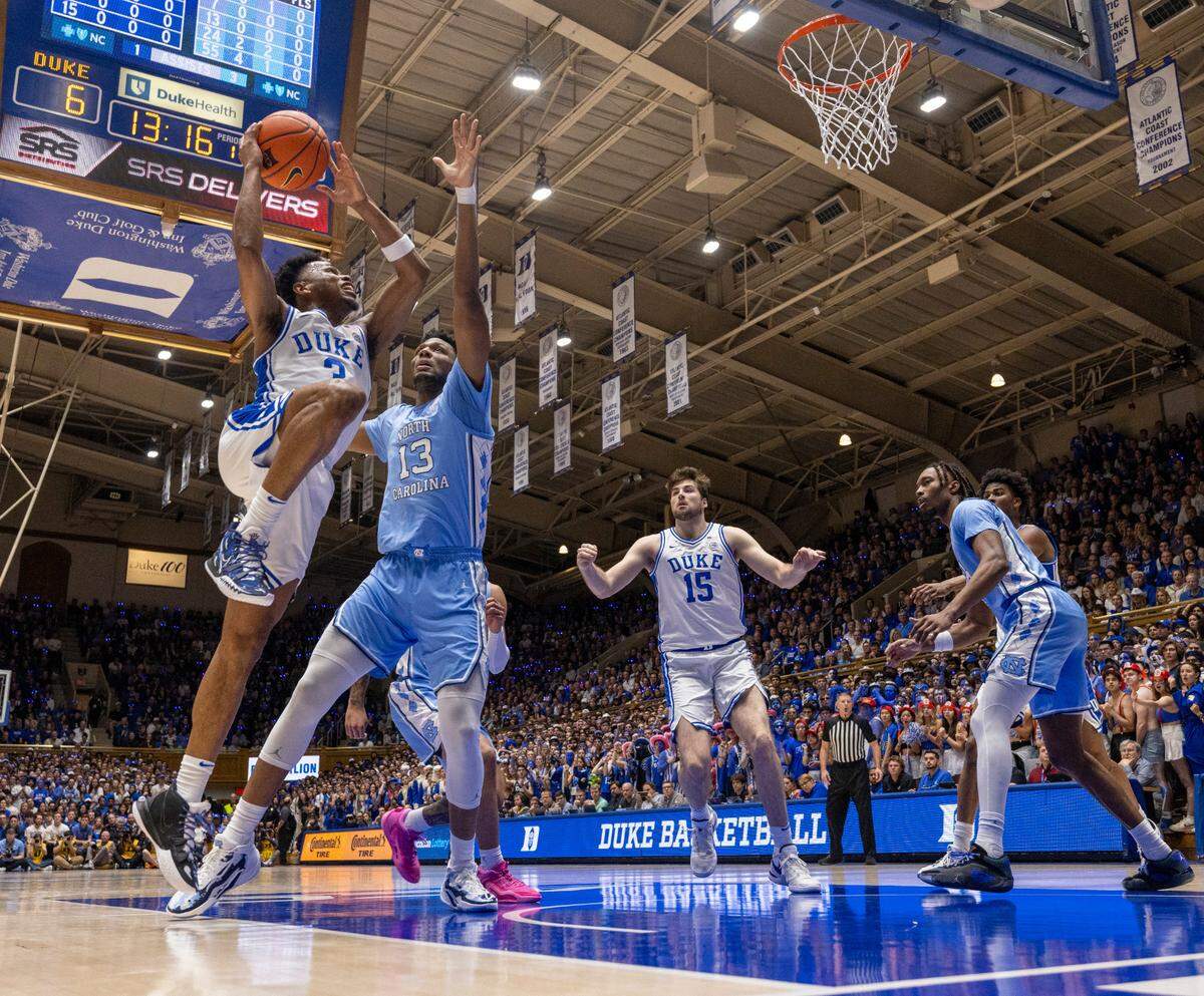 Duke’s Jeremy Roach (3) drives to the basket against North Carolina’s Harrison Ingram (55) in the first half on Saturday, March 9, 2024 at Cameron Indoor Stadium in Durham, N.C.