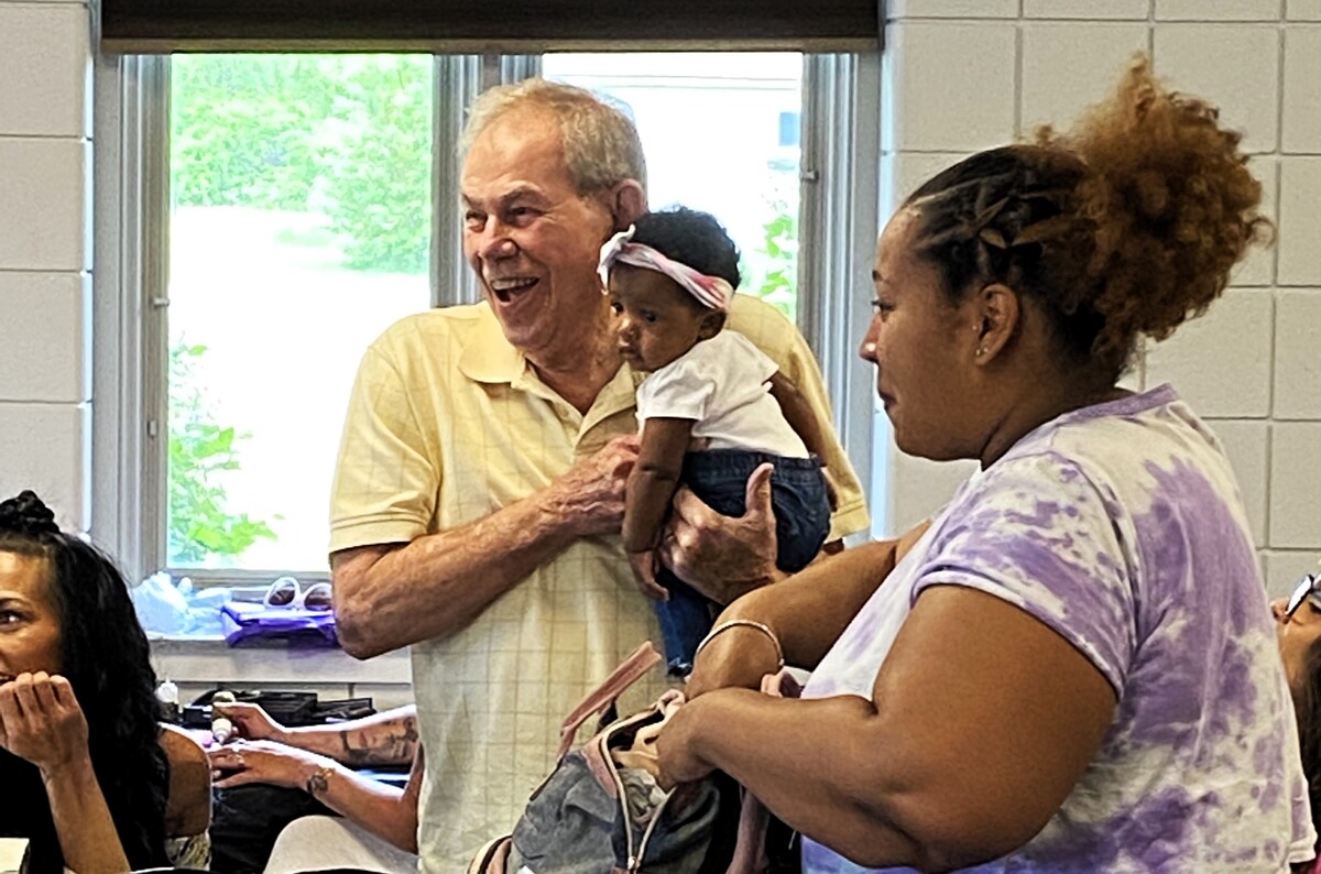 Gary Rasor (center) loved people and riding rollercoasters with his grandchildren, his son Jeff Rasor said in Orange County Superior Court on Friday, May 16, 2025. Rasor died on Nov. 30, 2022, after he was shoved to the floor during a robbery at Home Depot.