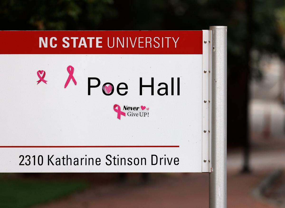 Stickers adorn a sign outside of Poe Hall on the campus of N.C. State University on Monday, July 29, 2024, in Raleigh, N.C.