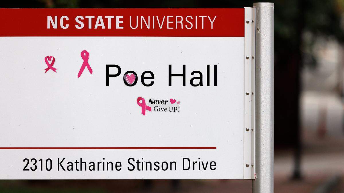 Stickers adorn a sign outside of Poe Hall on the campus of N.C. State University on Monday, July 29, 2024, in Raleigh, N.C.