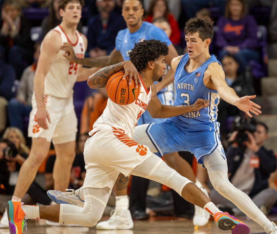 North Carolina’s Cormac Ryan (3) defends Clemson’s Dillon Hunter (2) in the second half on Saturday, January 6, 2024 at Littlejohn Coliseum in Clemson, S.C.
