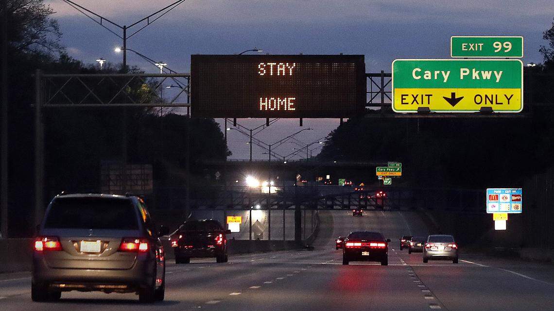 As part of COVID-19 information, a sign on U.S. 1 south reminds drivers to stay home Monday evening, March 30, 2020. Gov. Roy Cooper signed an Executive Order on Friday, directing North Carolinians to stay home for a month. The order went into effect at 5 p.m. on Monday.
