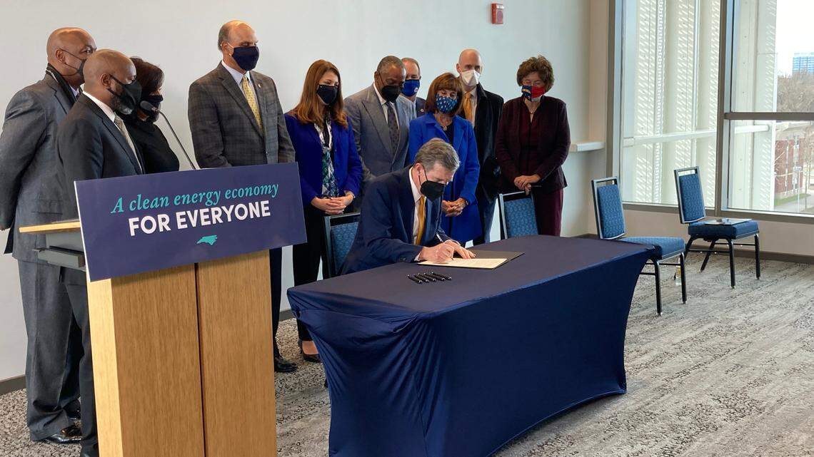 Gov. Roy Cooper signed Executive Order 246 on Friday at N.C. Agricultural and Technical State University, setting a target of a statewide 50% reduction in greenhouse gas emissions by 2030. The order also ordered the N.C. Department of Transportation to create a Clean Transportation Plan and called for environmental justice steps.