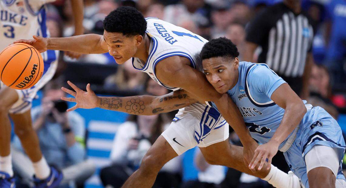 Duke’s Caleb Foster (1) steals the ball from Mount St. Mary’s Arlandus Keyes (2) during the second half of Duke’s 93-49 victory over Mount St. Mary’s in the first round of the 2025 NCAA Men’s Basketball Tournament at the Lenovo Center in Raleigh, N.C., Friday, March 21, 2025.