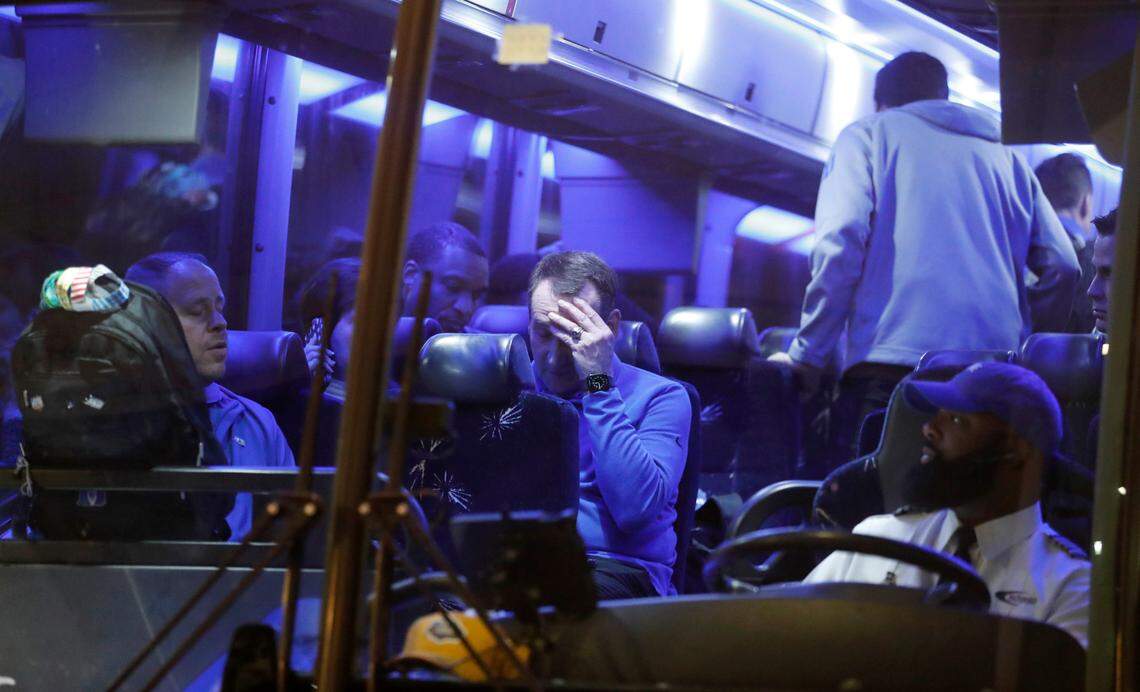 Duke head coach Mike Krzyzewski sits on the bus after leaving the arena after UNC’s 81-77 victory over Duke in the Final Four at Caesars Superdome in New Orleans, La., Saturday, April 2, 2022.