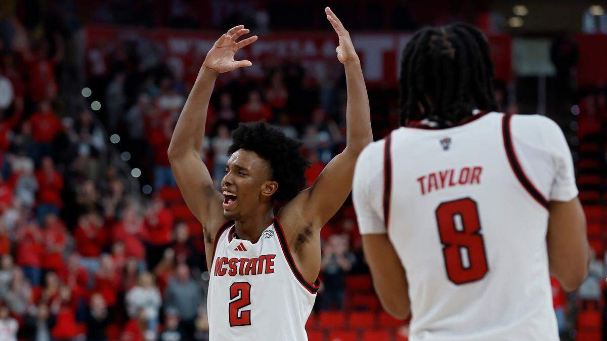 N.C. State’s Paul McNeil celebrates at the end of the Wolfpack’s 85-73 win over Wake Forest on Saturday, Feb. 22, 2025, at Lenovo Center in Raleigh, N.C.