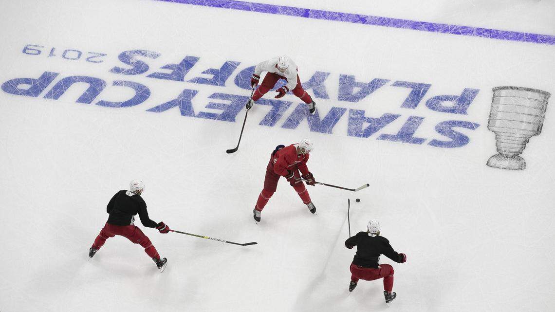Carolina Hurricanes’ Jordan Staal (11), center, skates with the puck by the logo for the 2019 Stanley Cup Playoffs during their practice on Tuesday, April 9, 2019 at PNC Arena in Raleigh, N.C. The Hurricanes with start their first round at Washington.