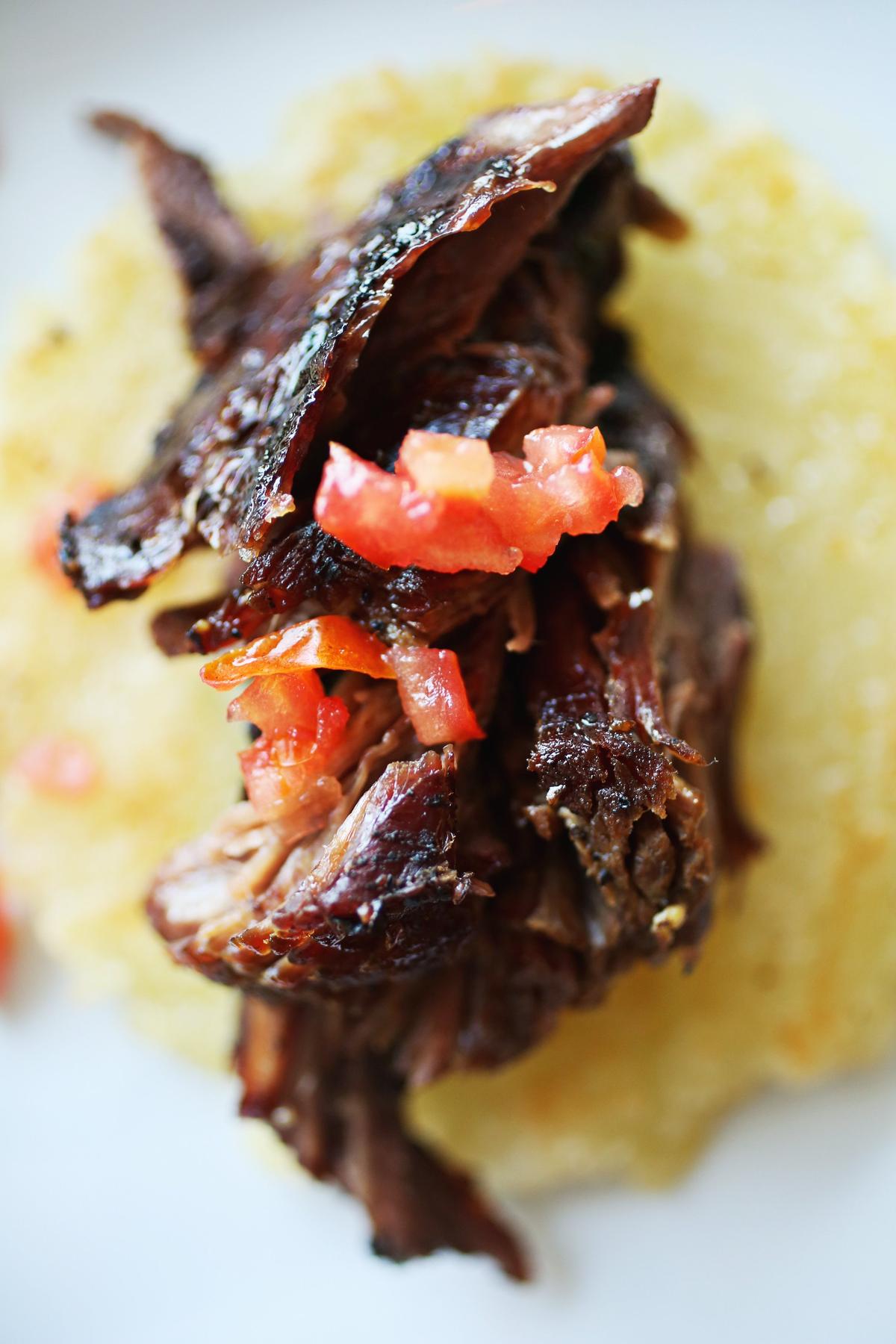 COPA’s Ropa vieja a la americana features NC grass-fed beef, slow-cooked with wine, mint, and a light tomato sauce served on crepe-like flatbreads made from cassava root.