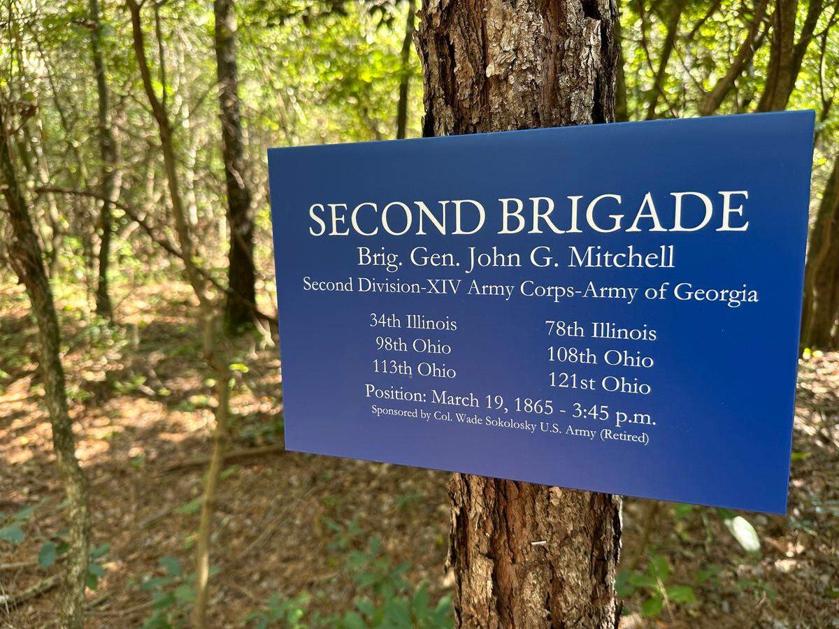 A new section of the Mountains-to-Sea Trail in the Bentonville Battlefield includes signs like these to indicate where Union and Confederate soldiers were and when during the battle in March 1865.