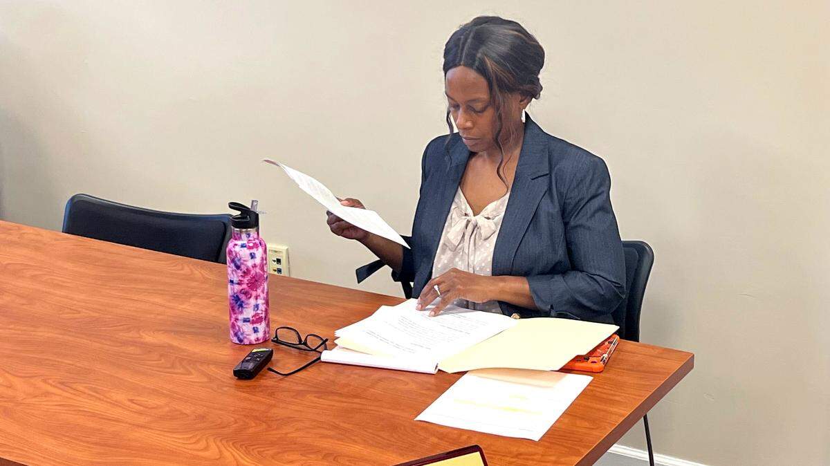 Kenly town manager Justine Jones prepares for a Town Council emergency session in Kenly N.C., Friday, July 22, 2022. The session is in response to the abrupt resignation of the police chief, four officers, and two administrators.