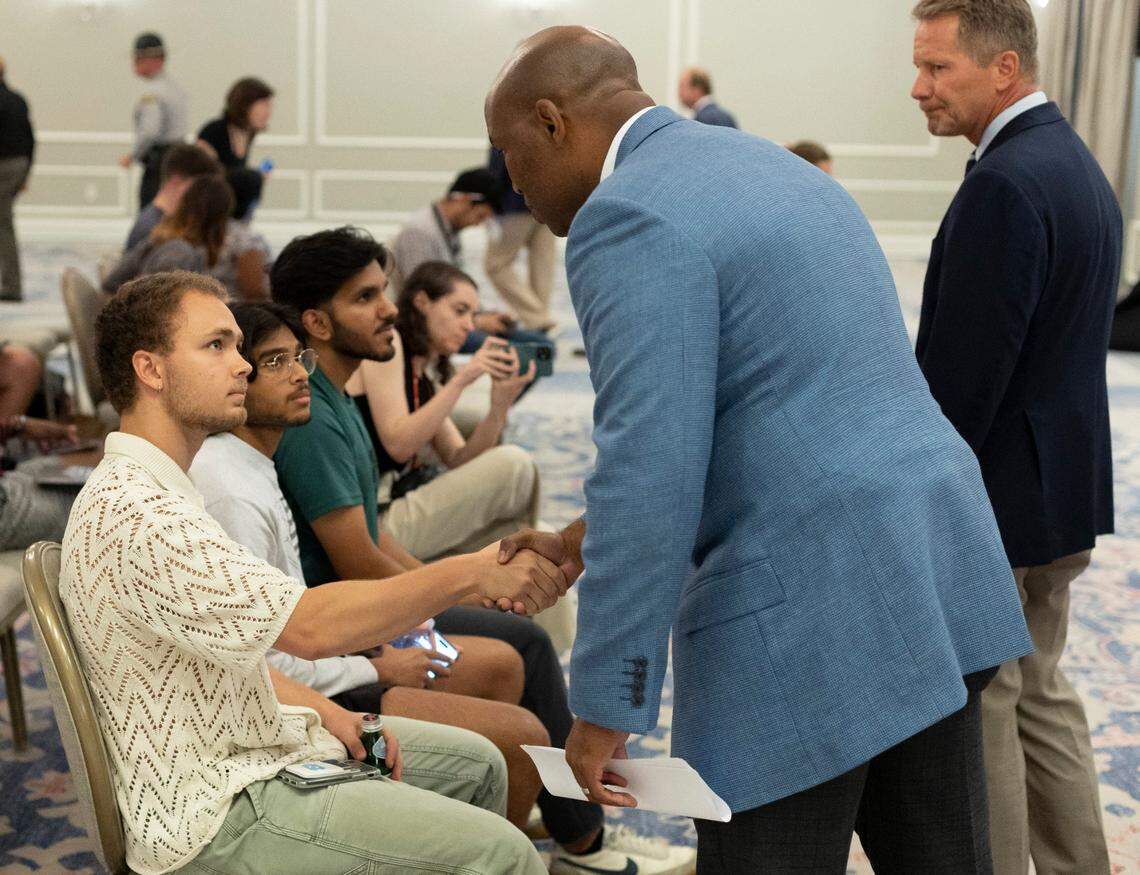 zUNC Police Chief Brian James shakes hands with University of North Carolina students following a press briefing at the Carolina Inn he announced that one university faculty member was killed in a shooting at Caudill Laboratories on Monday, August 28. 2023 in Chapel Hill, N.C.