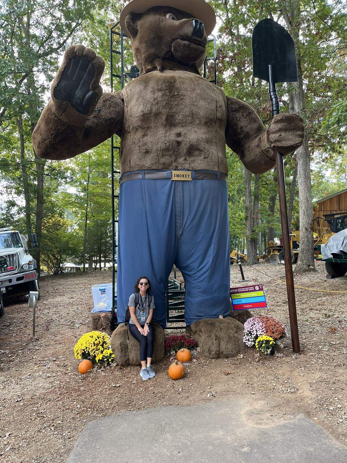 Kimberly Cataudella and the Smokey the Bear statue at the NC State Fair on Monday, October 17, 2022.