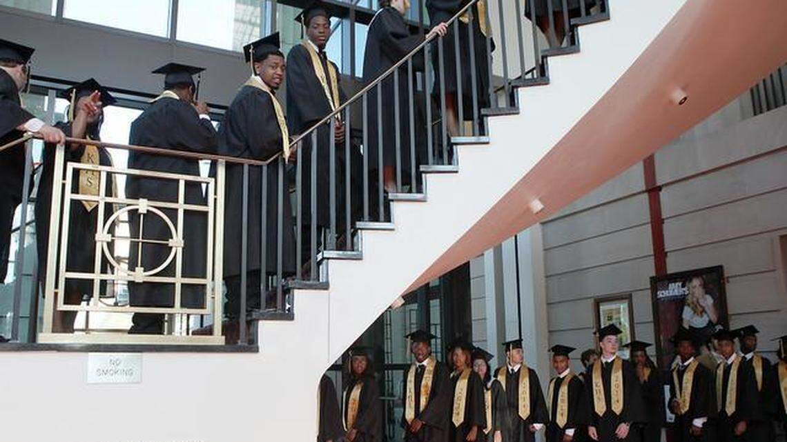 Members of the Knightdale High School Class of 2014 make their way up the steps into the Duke Energy Center for the Performing Arts’ Memorial Auditorium in downtown Raleigh for their graduation ceremony Tuesday, June 10, 2014.
