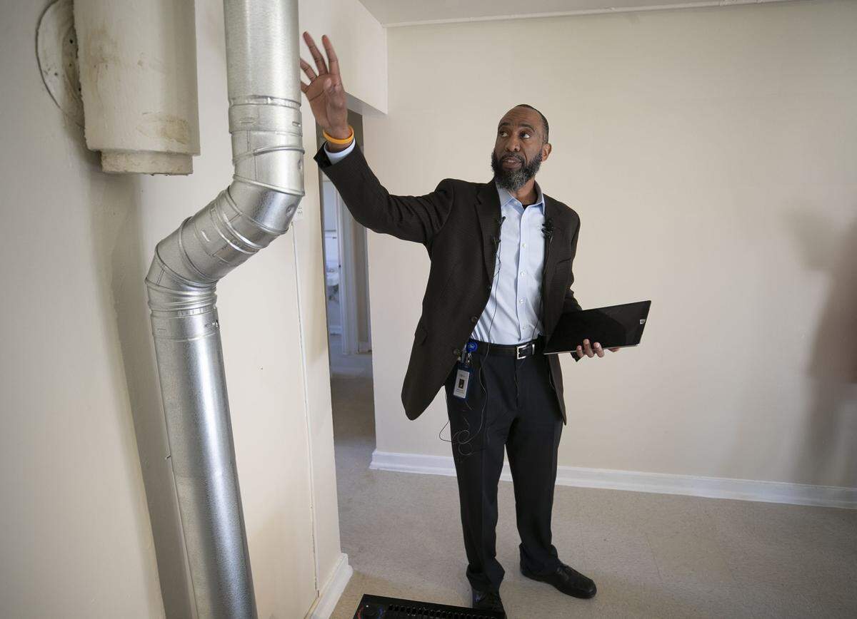 Durham Housing Authority CEO, Anthony Scott holds a press briefing in Building 35 on Friday, February 14, 2020 at McDougald Terrace in Durham, N.C. Scott describes how new heating and ventilation systems have been installed.