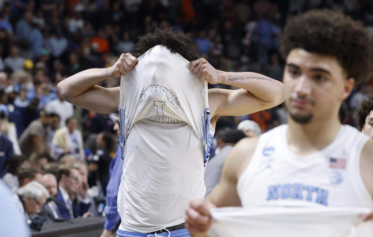 North Carolina's Zayden High (1) walks off the court after VCU’s 82-78 overtime victory over UNC in the first round of the NCAA Men’s Basketball Tournament at Bon Secours Wellness Arena in Greenville, S.C., Thursday, March 19, 2026.