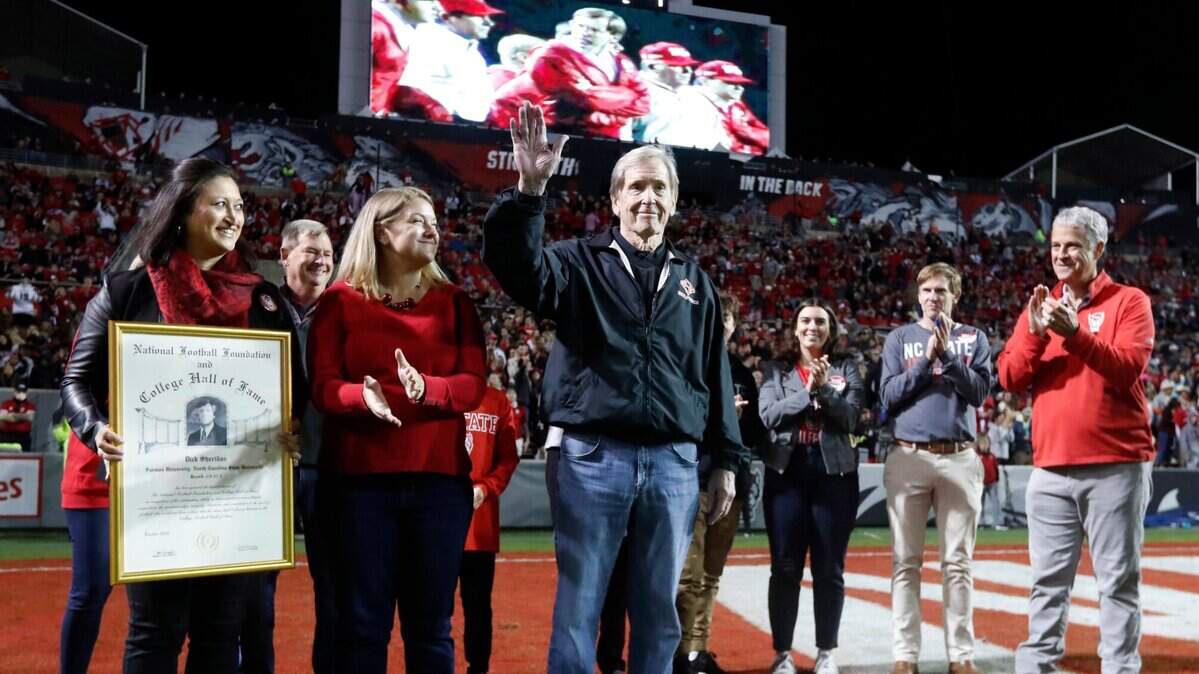 Former N.C. State coach Dick Sheridan is recognized during the first half of N.C. States game against Louisville at Carter-Finley Stadium in Raleigh, N.C., Saturday, October 30, 2021.