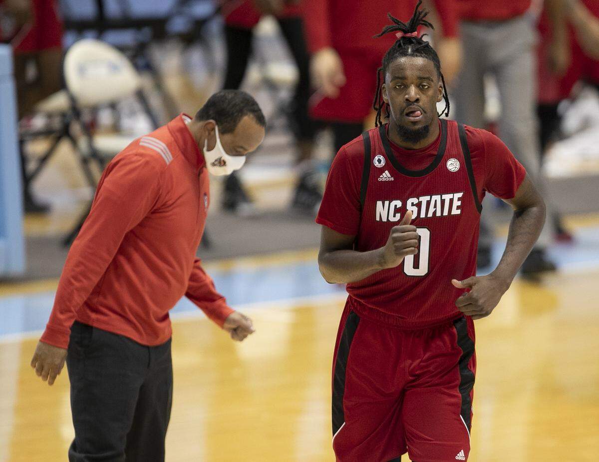 N.C. State’s D J Funderburk (0) leaves the court following the Wolfpack’s 86-76 loss to North Carolina on Saturday, January 23, 2021 at the Smith Center in Chapel Hill, NC.
