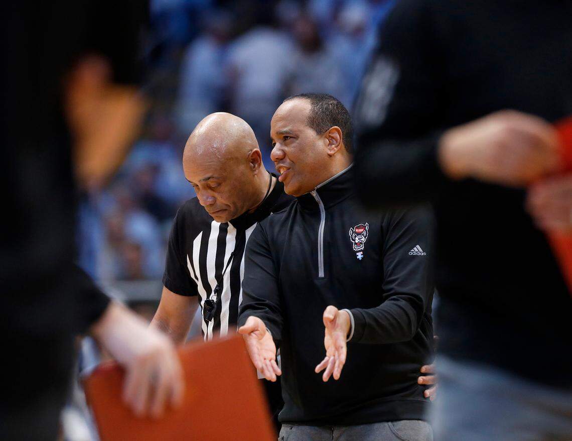 N.C. State head coach Kevin Keatts speaks with an official during the second half of the Wolfpack’s 79-70 loss to North Carolina on Saturday, March 2, 2024, at the Smith Center in Chapel Hill, N.C.