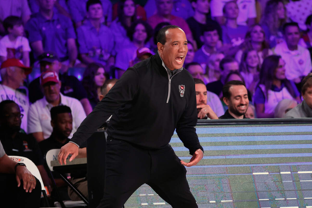 This photo provided by Bahamas Visual Services shows N.C. State head coach Kevin Keatts during the first half of an NCAA college basketball game against Kansas at the Battle 4 Atlantis at Paradise Island, Bahamas, Wednesday, Nov. 23, 2022.(Tim Aylen/Bahamas Visual Services via AP)