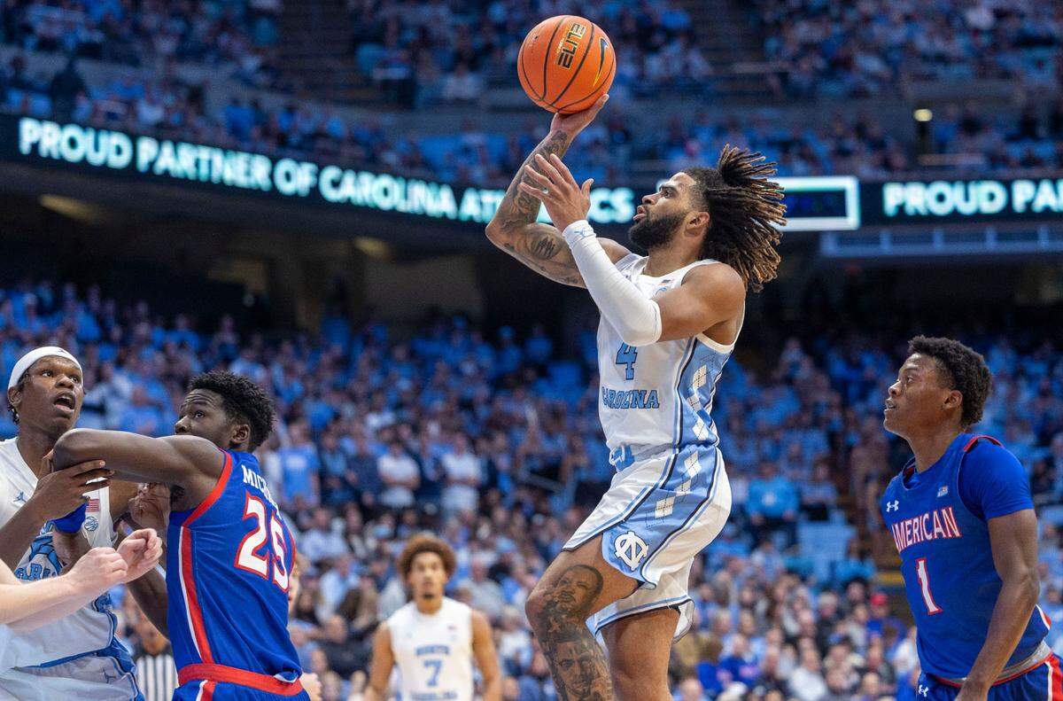 North Carolina guard R.J. Davis (4) puts up a shot over American University’s Eric Michaels (25) in the second half on Friday, November 15, 2024 at the Smith Center in Chapel Hill, N.C.