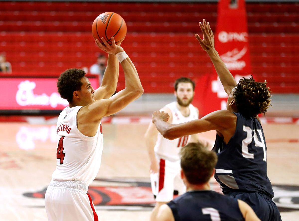 N.C. State’s Jericole Hellems (4) shoots as North Florida’s Jadyn Parker (24) defends during the second half of N.C. State’s 86-51 victory over North Florida in the Mako Medical Wolfpack Invitational at Reynolds Coliseum in Raleigh, N.C., Friday, Nov. 27, 2020.