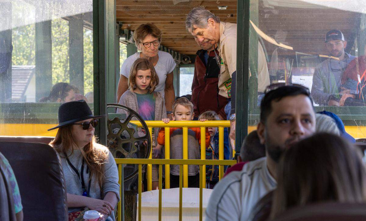 Passengers ride the New Hope Valley Railway from Bonsal to New Hope on Friday, April 12, 2024. The nonprofit railway celebrates its 40th year taking passengers or rides in southwest Wake County.